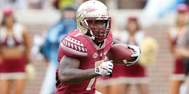 TALLAHASSEE, FL - SEPTEMBER 12: Mario Pender #7 of the Florida State Seminoles runs the ball against the South Florida Bulls during the game at Doak Campbell Stadium on September 12, 2015 in Tallahassee, Florida. Florida State defeated South Florida 34-14. (Photo by Joe Robbins/Getty Images)