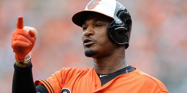BALTIMORE, MD - JUNE 28: Adam Jones #10 of the Baltimore Orioles reacts after fouling out against the Cleveland Indians at Oriole Park at Camden Yards on June 28, 2015 in Baltimore, Maryland. (Photo by G Fiume/Getty Images)