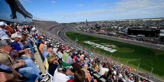 DAYTONA BEACH, FL - FEBRUARY 21: Fans look on from the grandstands during the NASCAR Sprint Cup Series DAYTONA 500 at Daytona International Speedway on February 21, 2016 in Daytona Beach, Florida. (Photo by Chris Trotman/NASCAR via Getty Images)