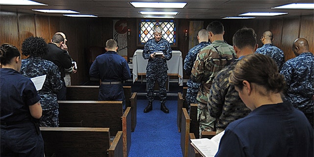 Jan. 30: Capt. Stephen Pike, chaplain of Commander, U.S. Naval Forces Europe-Africa/U.S. 6th Fleet, leads Sailors and embarked staff in prayer aboard the amphibious command ship USS Mount Whitney.