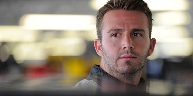 KANSAS CITY, KS - MAY 06: Matt DiBenedetto, driver of the #83 Cosmo Motors Toyota, looks on during practice for the NASCAR Sprint Cup Series Go Bowling 400 at Kansas Speedway on May 6, 2016 in Kansas City, Kansas. (Photo by Ed Zurga/Getty Images)