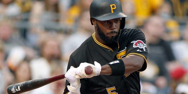 PITTSBURGH, PA - APRIL 18: Josh Harrison #5 of the Pittsburgh Pirates bats during the game against the Milwaukee Brewers at PNC Park on April 18, 2015 in Pittsburgh, Pennsylvania. (Photo by Justin K. Aller/Getty Images)