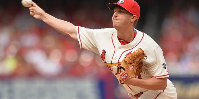 ST. LOUIS, MO - APRIL 18: Seth Maness #61 of the St. Louis Cardinals pitches against the Cincinnati Reds in the sixth inning at Busch Stadium on April 18, 2015 in St. Louis, Missouri. The Cardinals defeated the Reds 5-2. (Photo by Michael Thomas/Getty Images)
