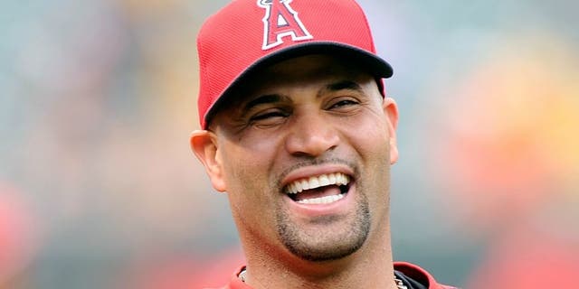 BALTIMORE, MD - MAY 15: Albert Pujols #5 of the Los Angeles Angels warms up before the game against the Baltimore Orioles at Oriole Park at Camden Yards on May 15, 2015 in Baltimore, Maryland. (Photo by G Fiume/Getty Images)