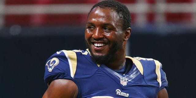 ST. LOUIS, MO - SEPTEMBER 7: Robert Quinn #94 of the St. Louis Rams warms up prior to playing against the Minnesota Vikings at the Edward Jones Dome on September 7, 2014 in St. Louis, Missouri. (Photo by Dilip Vishwanat/Getty Images)