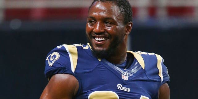 ST. LOUIS, MO - SEPTEMBER 7: Robert Quinn #94 of the St. Louis Rams warms up prior to playing against the Minnesota Vikings at the Edward Jones Dome on September 7, 2014 in St. Louis, Missouri. (Photo by Dilip Vishwanat/Getty Images)