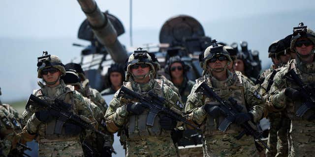 May 11, 2016: Georgian servicemen attend an opening ceremony of U.S. led joint military exercise "Noble Partner 2016" in Vaziani, Georgia.