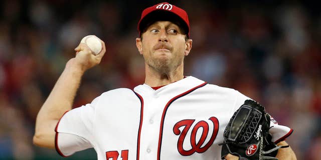 Washington Nationals starting pitcher Max Scherzer throws during the third inning of a baseball game against the Detroit Tigers at Nationals Park, Wednesday, May 11, 2016, in Washington.