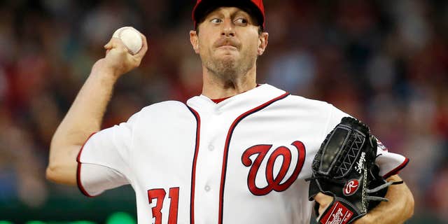 Washington Nationals starting pitcher Max Scherzer throws during the third inning of a baseball game against the Detroit Tigers at Nationals Park, Wednesday, May 11, 2016, in Washington.