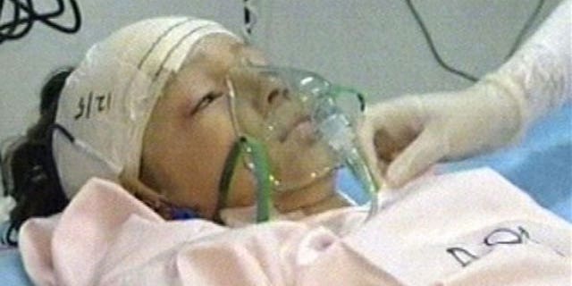In a photo released by Libya TV, the lone survivor of a Afriqiyah Airways plane crash in Tripoli is seen being treated.