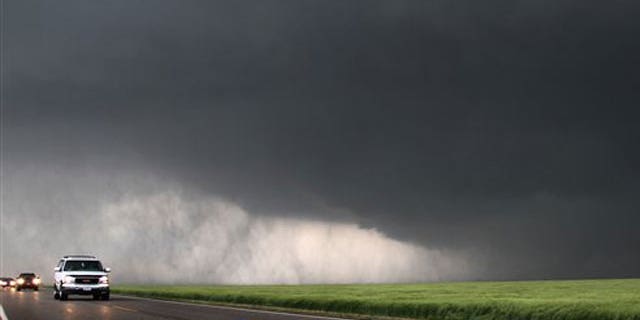 May 10: a super cell storm gains strength as it moves Northeast six miles from Wakita, Okla.