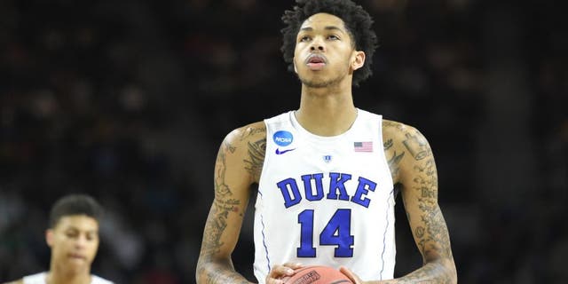 PROVIDENCE, RI - MARCH 19: Brandon Ingram #14 of the Duke Blue Devils takes a foul shot during a first round NCAA College Basketball Tournament game against the Yale Bulldogs at Dunkin' Donuts Center on March 19, 2016 in Providence, Rhode Island. The Blue Devils won 71-64. (Photo by Mitchell Layton/Getty Images)