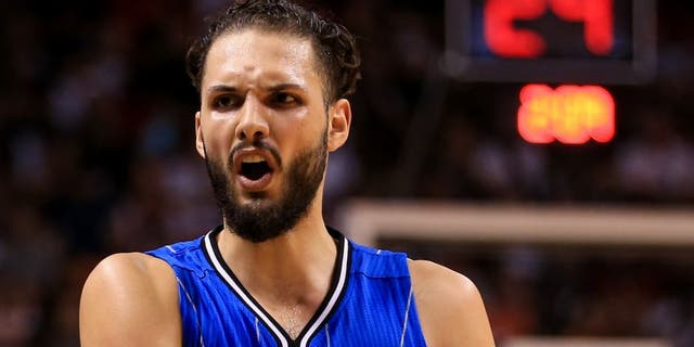 MIAMI, FLORIDA - APRIL 10: Evan Fournier #10 of the Orlando Magic reacts during the game against the Miami Heat at the American Airlines Arena on April 10, 2016 in Miami, Florida. The Heat defeated the Magic 118-96. NOTE TO USER: User expressly acknowledges and agrees that, by downloading and or using this photograph, User is consenting to the terms and conditions of the Getty Images License Agreement. (Photo by Rob Foldy/Getty Images)