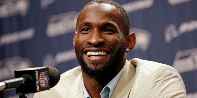 Seattle Seahawks' Ricardo Lockette speaks at a news conference while announcing his retirement at the team's football training facility Thursday, May 12, 2016, in Renton, Wash. (AP Photo/Elaine Thompson)
