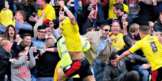 Football - Watford v Leicester City - npower Football League Championship Play-Off Semi Final Second Leg - Vicarage Road - 12/5/13 Watford's Troy Deeney (L) celebrates scoring their third goal Mandatory Credit: Action Images / Andrew Couldridge Livepic EDITORIAL USE ONLY. No use with unauthorized audio, video, data, fixture lists, club/league logos or "live" services. Online in-match use limited to 45 images, no video emulation. No use in betting, games or single club/league/player publications. Please contact your account representative for further details.