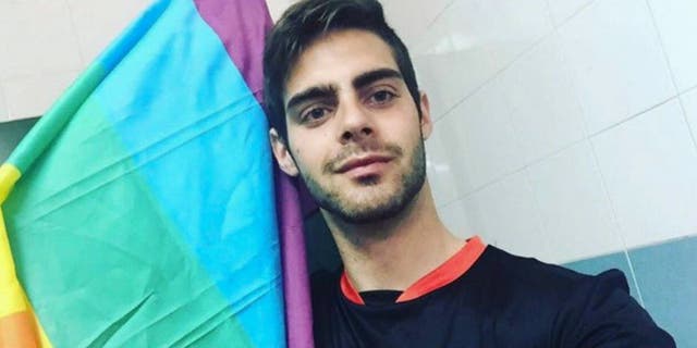 In this Friday, April 1, 2016 photo, Jesus Tomillero poses for a selfie at his home in La Linea, Cadiz, southern Spain. Tomillero, a gay Spanish soccer referee is giving up the job after repeatedly being the target of verbal abuse at games because of his sexual orientation. (AP Photo/Jesus Tomillero)