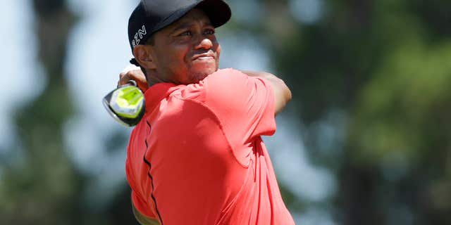 May 10, 2015: Tiger Woods hits from the 16 tee during the final round of The Players Championship golf tournament.