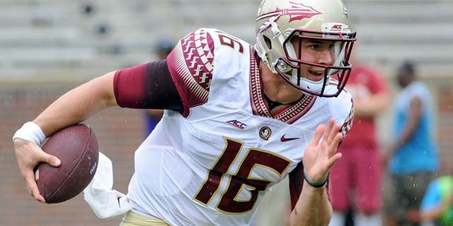 Apr 11, 2015; Tallahassee, FL, USA; Florida State Seminoles quarterback J.J. Cosentino (16) runs the ball during the spring game at Doak Campbell Stadium. Mandatory Credit: Melina Vastola-USA TODAY Sports