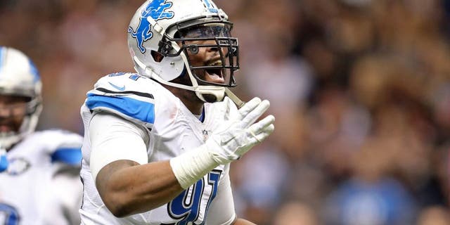 Dec 21, 2015; New Orleans, LA, USA; Detroit Lions defensive end Jason Jones (91) celebrates a sack against the New Orleans Saints in the third quarter of the game at the Mercedes-Benz Superdome. Mandatory Credit: Chuck Cook-USA TODAY Sports