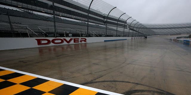DOVER, DE - OCTOBER 02: A view of the start/finish line on the track in the rain before practice for the NASCAR Sprint Cup Series AAA 400 at Dover International Speedway on October 2, 2015 in Dover, Delaware. (Photo by Sean Gardner/NASCAR via Getty Images)
