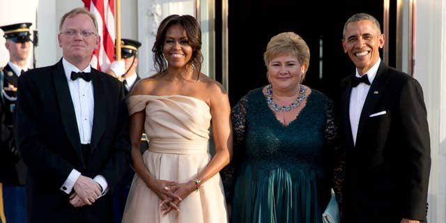 May 13, 2016: President Barack Obama and first lady Michelle Obama stand with Norwegian Prime Minister Erna Solberg and her husband Sindre Finnes as they arrive at the North Portico of the White House in Washington.