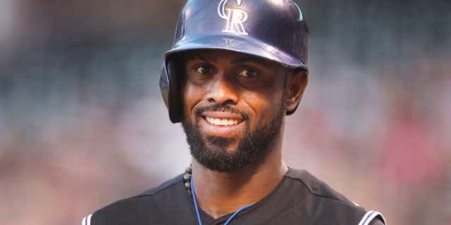 FILE - In this Aug. 21, 2015, file photo, Colorado Rockies shortstop Jose Reyes is seen in the first inning of a baseball game in Denver.