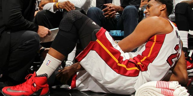 MIAMI, FL - MAY 7: Hassan Whiteside #21 of the Miami Heat is looked at in Game Three of the Eastern Conference Semifinals between the Toronto Raptors and Miami Heat during the 2016 NBA Playoffs on May 7, 2016 at AmericanAirlines Arena in Miami, Florida. NOTE TO USER: User expressly acknowledges and agrees that, by downloading and or using this Photograph, user is consenting to the terms and conditions of the Getty Images License Agreement. Mandatory Copyright Notice: Copyright 2016 NBAE (Photo by Issac Baldizon/NBAE via Getty Images)