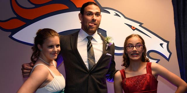 DENVER, CO - MAY 13: Denver Broncos quarterback Mark Sanchez poses for a photo during a Night of Champions prom. Teens got their makeup, hair and nails done before prom night May 13, 2016 at Sports Authority Field at Mile High. Some of the teens missed their own prom due to illness and just couldn't attend. Childrens Hospital hosted the Night of Champions gala. (Photo By John Leyba/The Denver Post via Getty Images)
