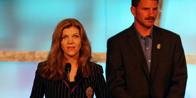 CHARLOTTE, NC - MAY 23: (L-R) Teresa Earnhardt speaks as Kerry Earnhardt, Kelley Earnhardt Elledge, Dale Earnhardt Jr. and Taylor Earnhardt stand on stage as Dale Earnhardt Sr. gets inducted into the 2010 NASCAR Hall of Fame Induction Ceremony at the Charlotte Convention Center on May 23, 2010 in Charlotte, North Carolina. (Photo by Streeter Lecka/Getty Images)