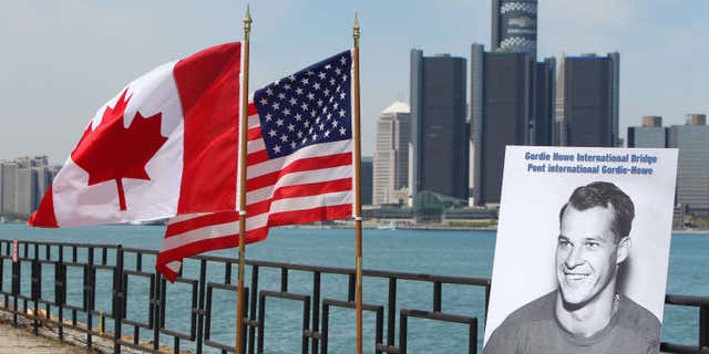 May 14, 2015: A photograph of Gordie Howe is displayed on the riverfront after a news conference.