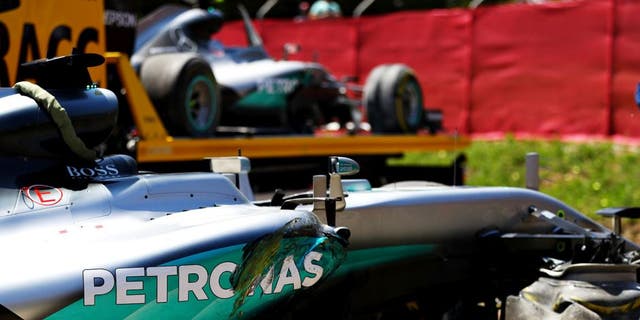 MONTMELO, SPAIN - MAY 15: The car of Lewis Hamilton of Great Britain and Mercedes GP at the side of the track, behind is the car of Nico Rosberg of Germany and Mercedes GP after they crashed together during the Spanish Formula One Grand Prix at Circuit de Catalunya on May 15, 2016 in Montmelo, Spain. (Photo by Clive Mason/Getty Images)