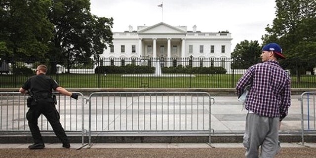 May 2: Sidewalk in front of the White House in Washington is reopened.