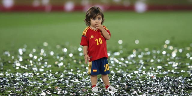 Football - Spain v Italy - UEFA EURO 2012 Final - Olympic Stadium, Kiev, Ukraine - 1/7/12 Spain's Santi Cazorla's son celebrates after the match Mandatory Credit: Action Images / Carl Recine Livepic
