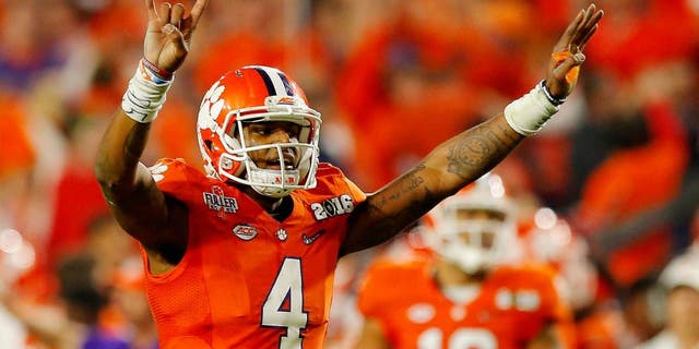 GLENDALE, AZ - JANUARY 11: Deshaun Watson #4 of the Clemson Tigers reacts against the Alabama Crimson Tide during the 2016 College Football Playoff National Championship Game at University of Phoenix Stadium on January 11, 2016 in Glendale, Arizona. (Photo by Kevin C. Cox/Getty Images)
