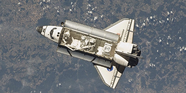 May 18: This image provided by NASA taken by one of the Expedition 27 crew members aboard the International Space Station shows the space shuttle Endeavour as the two spacecraft made their relative approach.