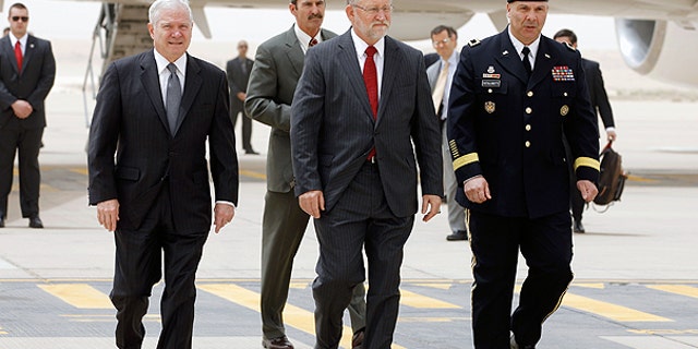 April 6: Defense Secretary Robert Gates, left, U.S. Ambassador to Saudi Arabia James Smith, center, and Maj. Gen. Robert Catalanotti, right, walk across the tarmac in Riyadh, Saudi Arabia.