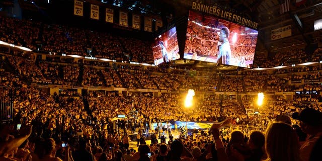May 18, 2014; Indianapolis, IN, USA; The Indiana Pacers are introduced before game one of the Eastern Conference Finals of the 2014 NBA Playoffs against the Miami Heat at Bankers Life Fieldhouse. Mandatory Credit: Marc Lebryk-USA TODAY Sports