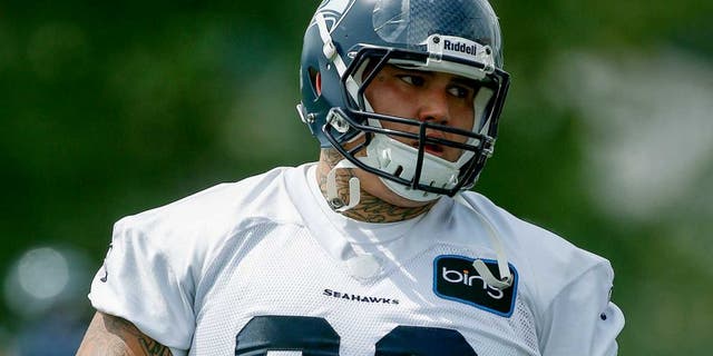 RENTON, WA - MAY 11: Defensive tackle Jesse Williams #90 of the Seattle Seahawks runs through a drill during Rookie Camp at the Virginia Mason Athletic Center on May 11, 2013 in Renton, Washington. (Photo by Otto Greule Jr/Getty Images)