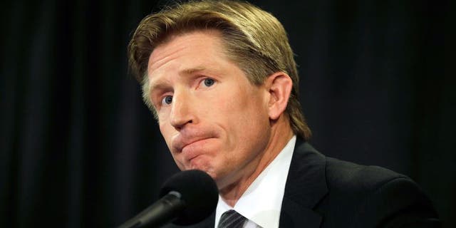 Philadelphia Flyers newly-hired head coach Dave Hakstol listens to a reporter's question during a news conference, Monday, May 18, 2015, in Philadelphia. (AP Photo/Matt Slocum)