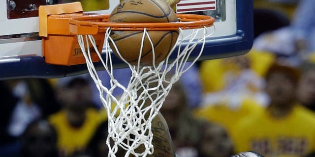 Cleveland Cavaliers' LeBron James (23) dunks against the Toronto Raptors during the first half of Game 1 of the NBA basketball Eastern Conference finals, Tuesday, May 17, 2016, in Cleveland. (AP Photo/Tony Dejak)