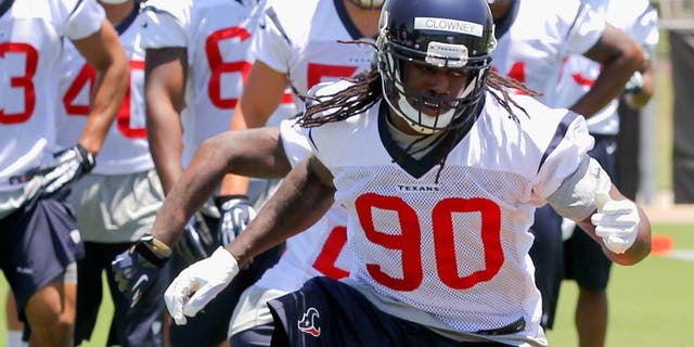 HOUSTON, TX - MAY 16: Jadeveon Clowney #90 of the Houston Texans during opening day of rookie minicamp on May 16, 2014 in Houston, Texas. (Photo by Bob Levey/Getty Images)