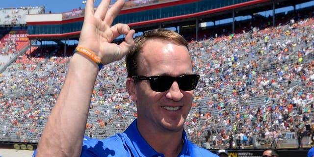during the NASCAR Sprint Cup Series Food City 500 at Bristol Motor Speedway on April 17, 2016 in Bristol, Tennessee.,BRISTOL, TN - APRIL 17: Former NFL quarterback, Peyton Manning stands on the grid prior to the NASCAR Sprint Cup Series Food City 500 at Bristol Motor Speedway on April 17, 2016 in Bristol, Tennessee. (Photo by Robert Laberge/Getty Images)