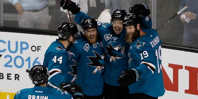 SAN JOSE, CA - MAY 19: (2nd R) Tomas Hertl #48 of the San Jose Sharks celebrates with Justin Braun #61, Marc-Edouard Vlasic #44, Joe Pavelski #8 and Joe Thornton #19 after his second goal in game three of the Western Conference Finals against the St. Louis Blues during the 2016 NHL Stanley Cup Playoffs at SAP Center on May 19, 2016 in San Jose, California. (Photo by Christian Petersen/Getty Images)
