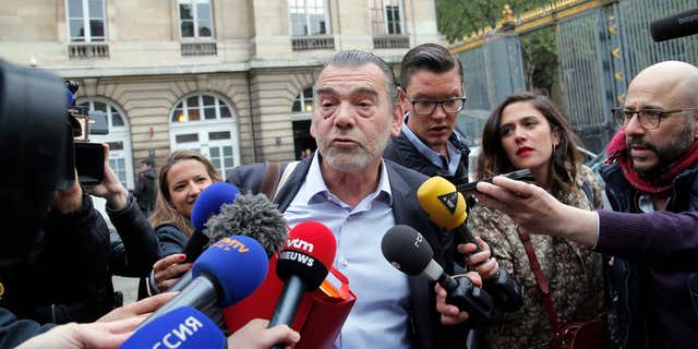May 20, 2016: Frank Berton, lawyer of Paris attacks suspect Salah Abdeslam, addresses the media as he arrives at the Paris courthouse.