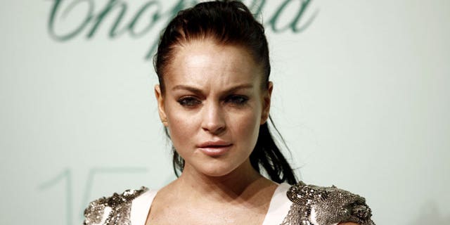 May 17: Lindsay Lohan arrives for the Chopard 150th anniversary party, during the 63rd international film festival, in Cannes, France.