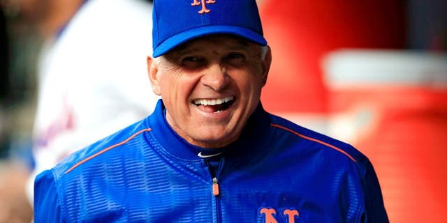 NEW YORK, NY - APRIL 21: Terry Collins #10 of the New York Mets laughs in the dugout prior to a game against the Atlanta Braves at Citi Field on April 21, 2015 in the Flushing neighborhood of the Queens borough of New York City. (Photo by Alex Trautwig/Getty Images)