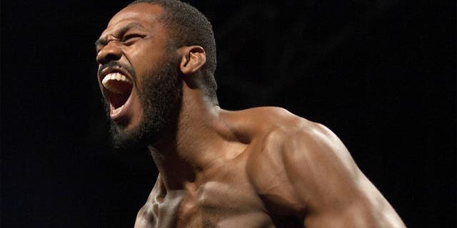 LAS VEGAS, NEVADA - JANUARY 02: UFC light heavyweight champion Jon Jones steps on the scale during the UFC 182 weigh-ins at the MGM Grand Marquee Ballroom on January 2, 2015 in Las Vegas, Nevada. (Photo by Brandon Magnus/Zuffa LLC/Zuffa LLC via Getty Images)