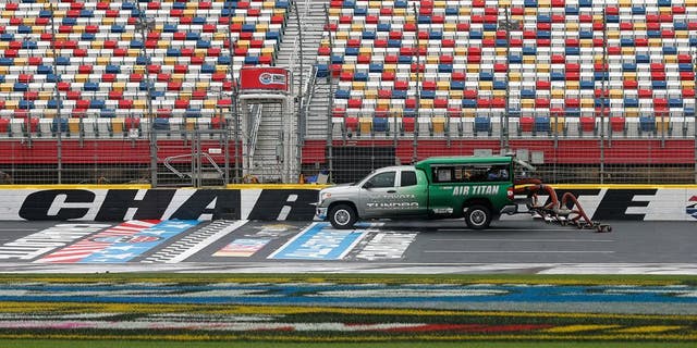 CHARLOTTE, NC - MAY 20: An Air Titan 2.0 truck works to dry the track prior to practice for the NASCAR Sprint Cup Series Sprint Showdown at Charlotte Motor Speedway on May 20, 2016 in Charlotte, North Carolina. (Photo by Brian Lawdermilk/Getty Images)