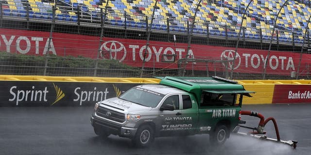 CHARLOTTE, NC - MAY 19: An Air Titan 2.0 works to dry the track prior to practice for the NASCAR Camping World Truck Series North Carolina Education Lottery 200 at Charlotte Motor Speedway on May 19, 2016 in Charlotte, North Carolina. (Photo by Matt Sullivan/NASCAR via Getty Images)