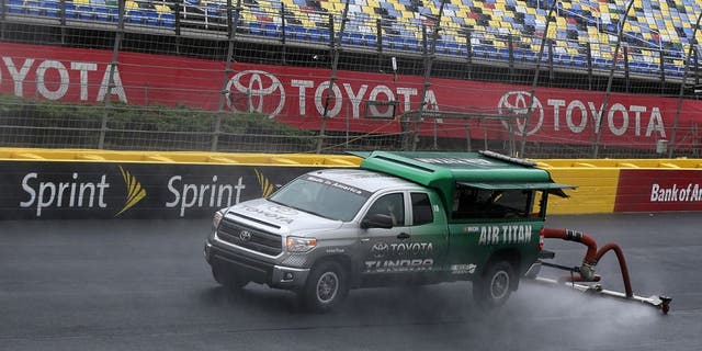 CHARLOTTE, NC - MAY 19: An Air Titan 2.0 works to dry the track prior to practice for the NASCAR Camping World Truck Series North Carolina Education Lottery 200 at Charlotte Motor Speedway on May 19, 2016 in Charlotte, North Carolina. (Photo by Matt Sullivan/NASCAR via Getty Images)